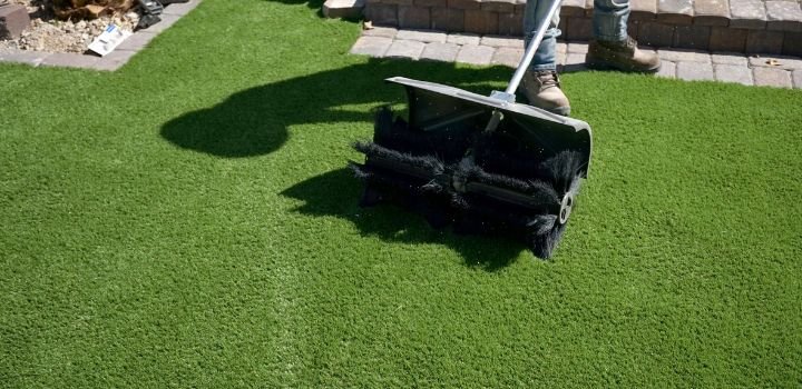 Cleaning artificial grass