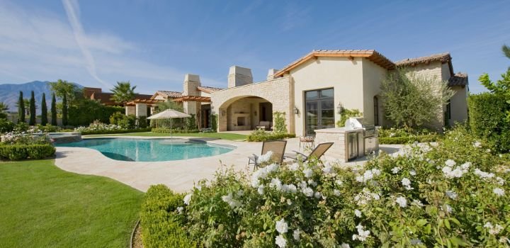 House Exterior With Swimming Pool And Garden